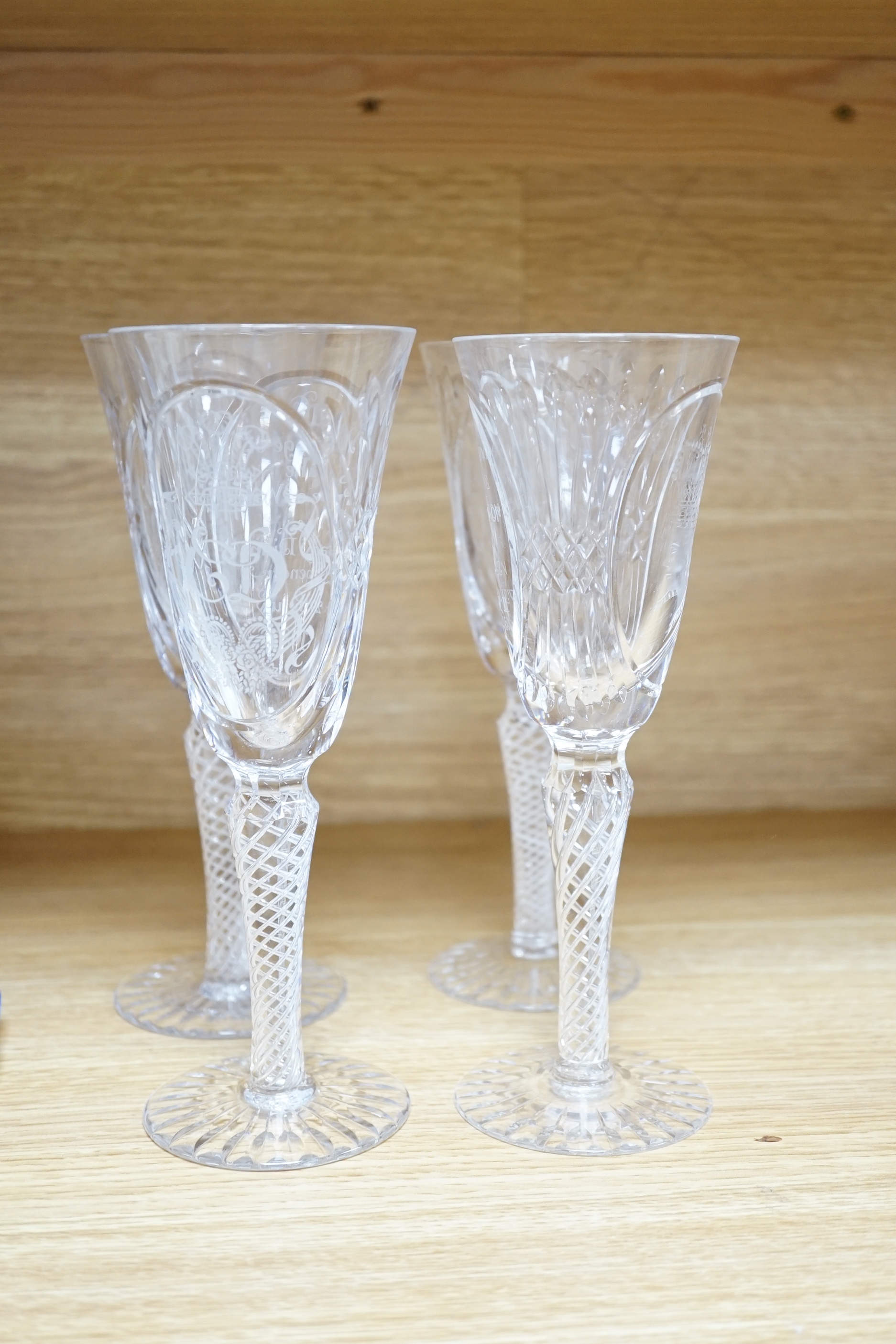 A collection of etched commemorative glasses (12)